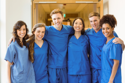 six medical staff smiling